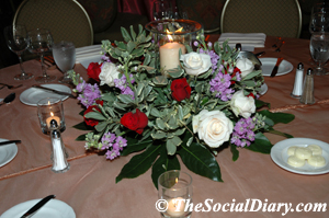charity ball dining table setting with floral arrangement